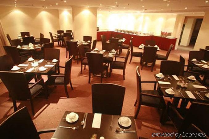 Dolphin Hotel apartamentos Dubái Restaurante foto